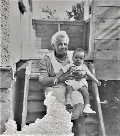 Mary Tyrrell Bell lovingly holds her grandson, Rick Bell, ca. 1950 · A ...